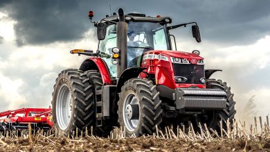 MF 8700S High Horse power tractor in a corn field