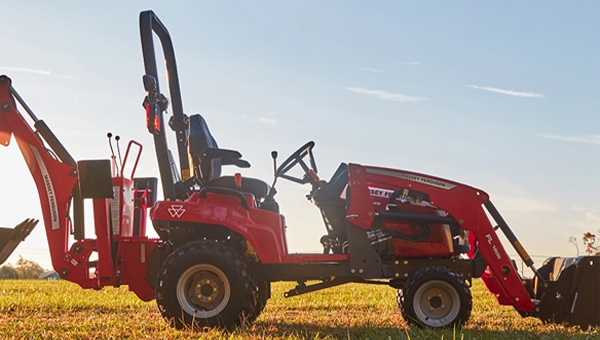 Side profile of a Massey Ferguson 1GC Series sub-compact tractor showcasing its compact design and versatile attachments for various tasks.